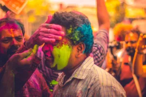 A man dressed up as Lord Krishna for Holi festival